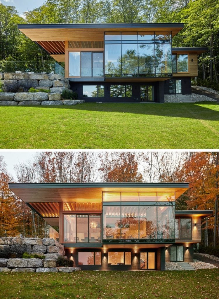 A Couple Of Contemporary Cottages Overlook A Lake In Canada