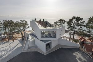 IDMM architects' waveon café embraces the coastal scene of Gijang in Korea