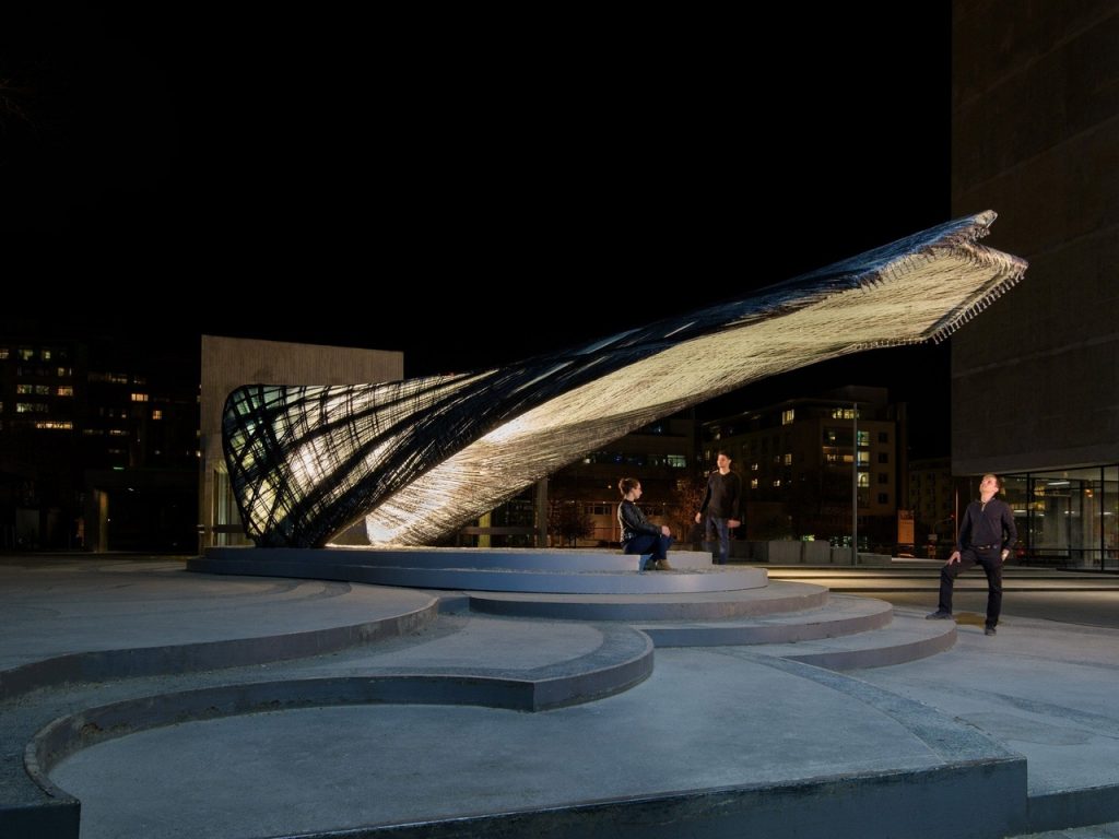 Drones and robots weave carbon-fibre pavilion based on moth webs