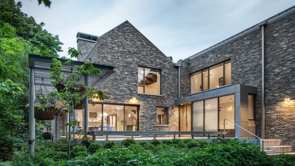 Farm buildings inform design of Canadian lakeside home by Trevor Horne Architects