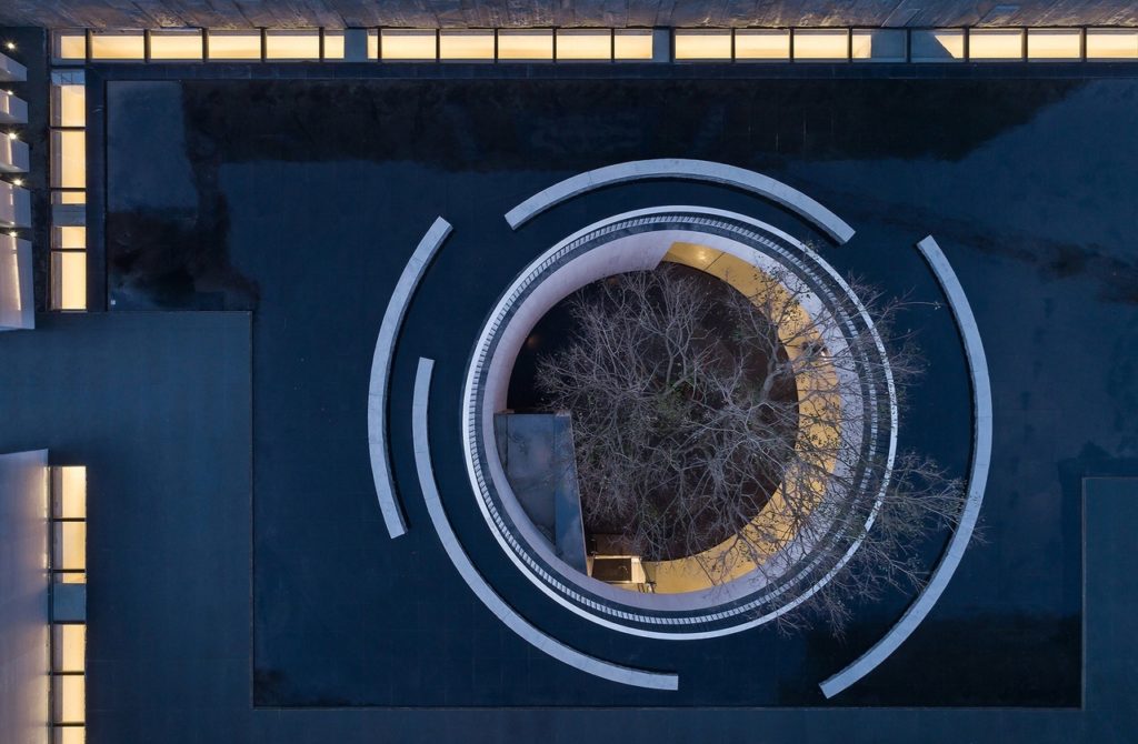 Waterfrom Design builds tea house with a basement hidden beneath a water pool