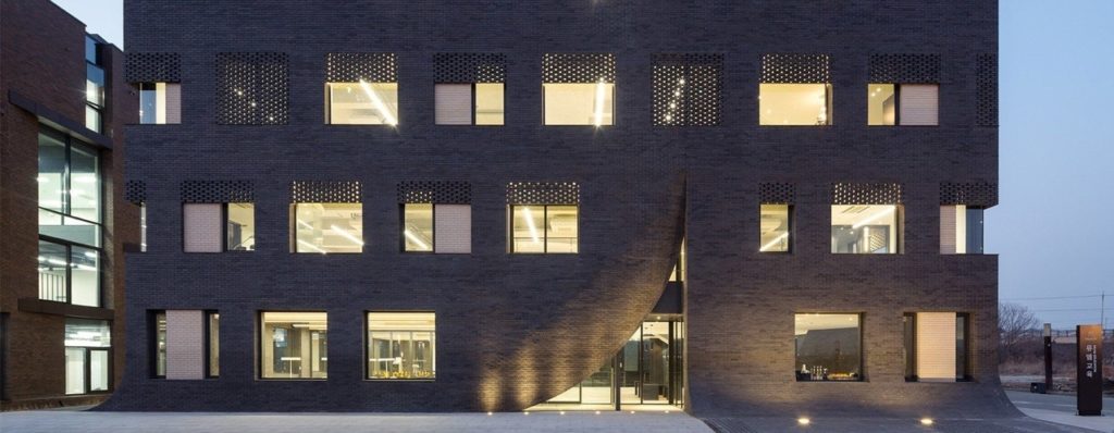wise architecture conceives MU:M office building like an owl's nest in south korea