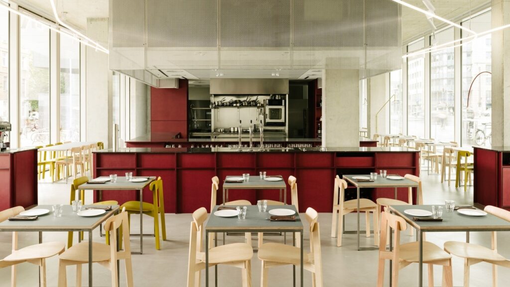 Remi restaurant in Berlin is defined by cherry-red joinery