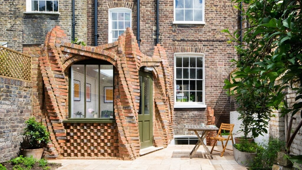 Twisting brick columns support London terrace extension by Urban Mesh